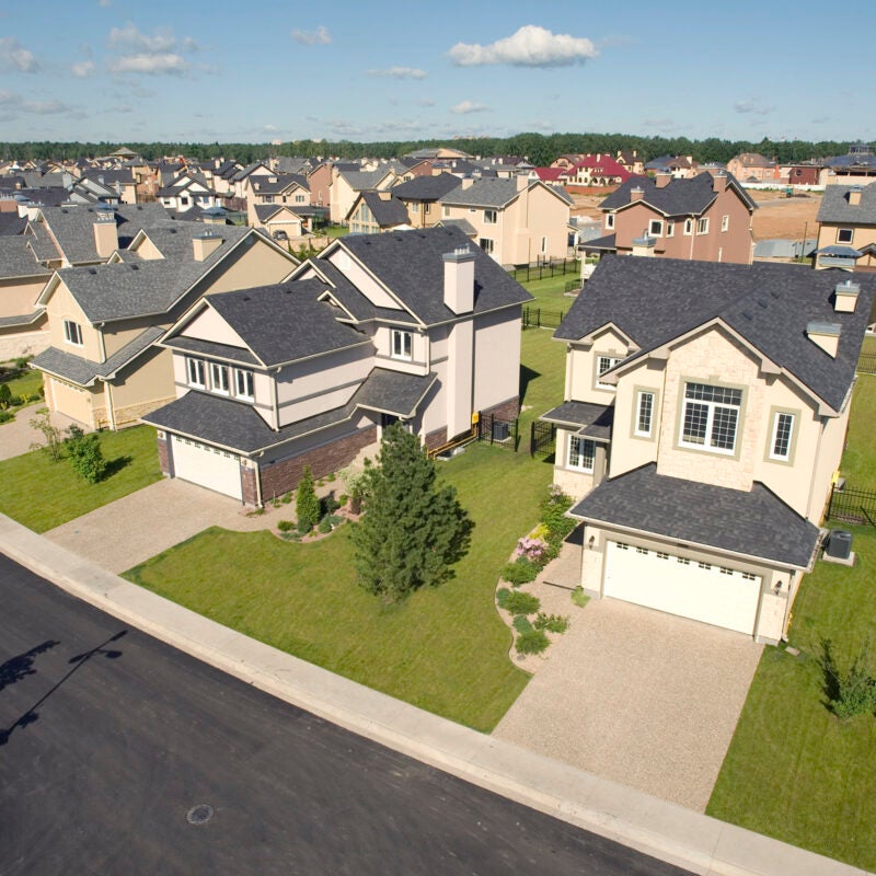High angle view of several suburban houses.