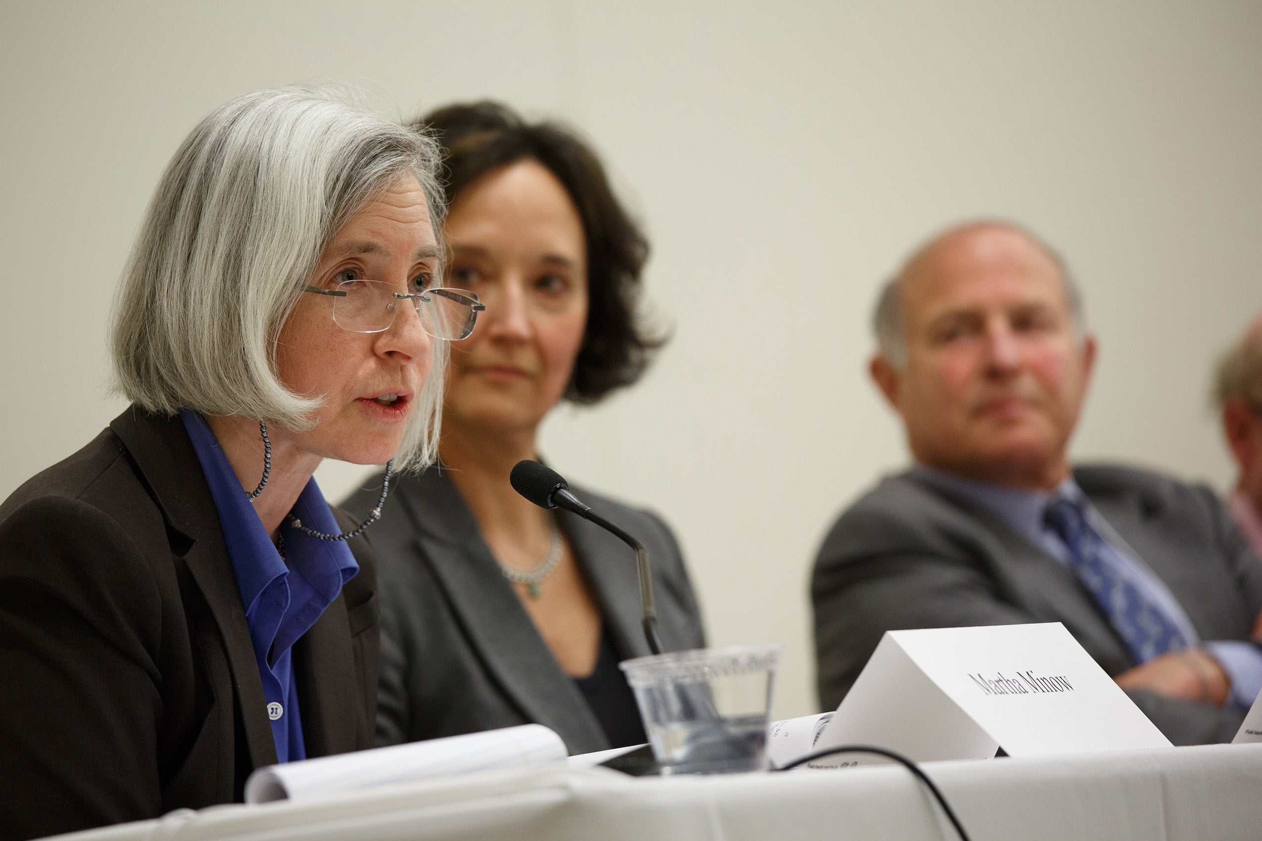 Panelists seated at table