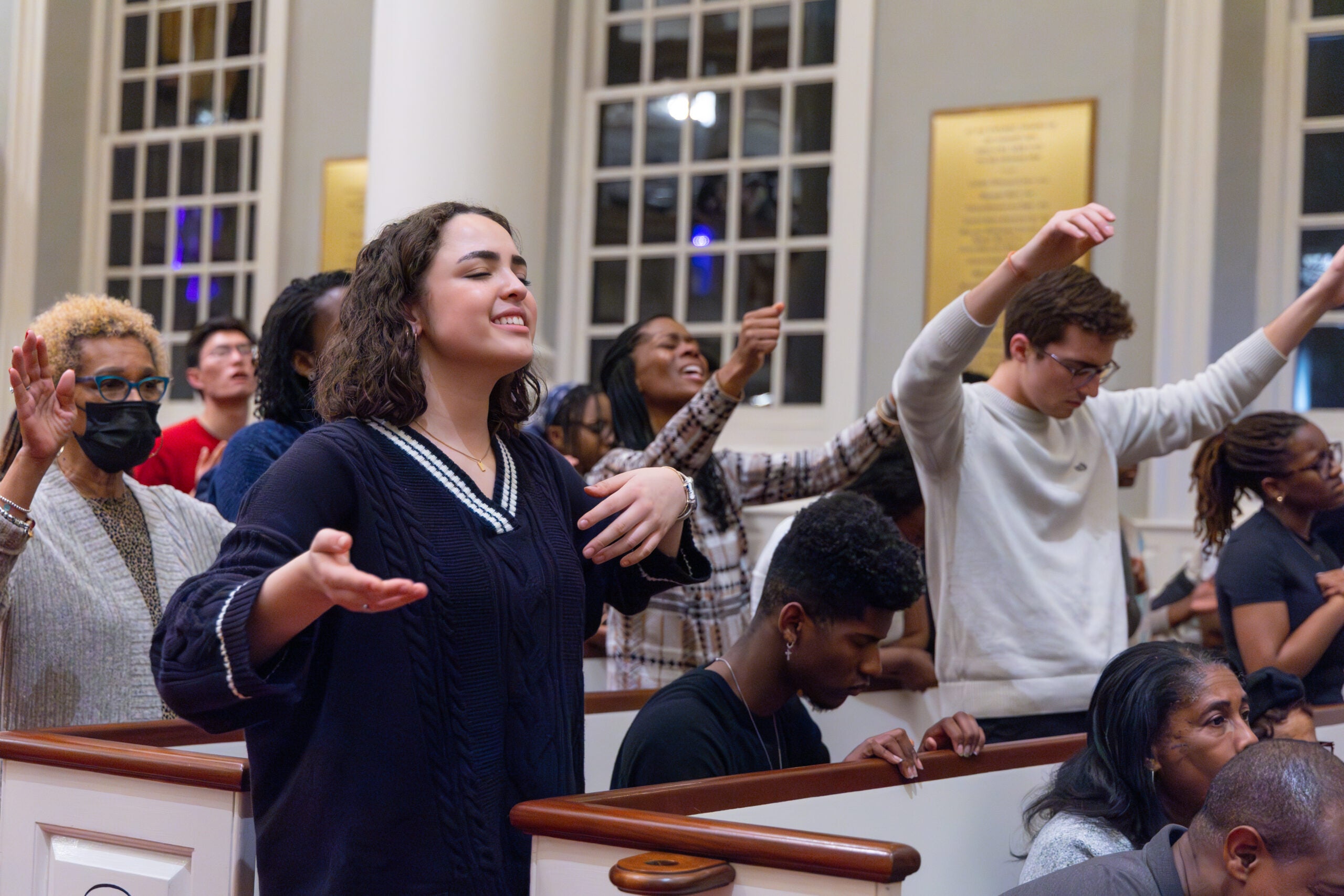 People sing and pray at the Celebration of Hope