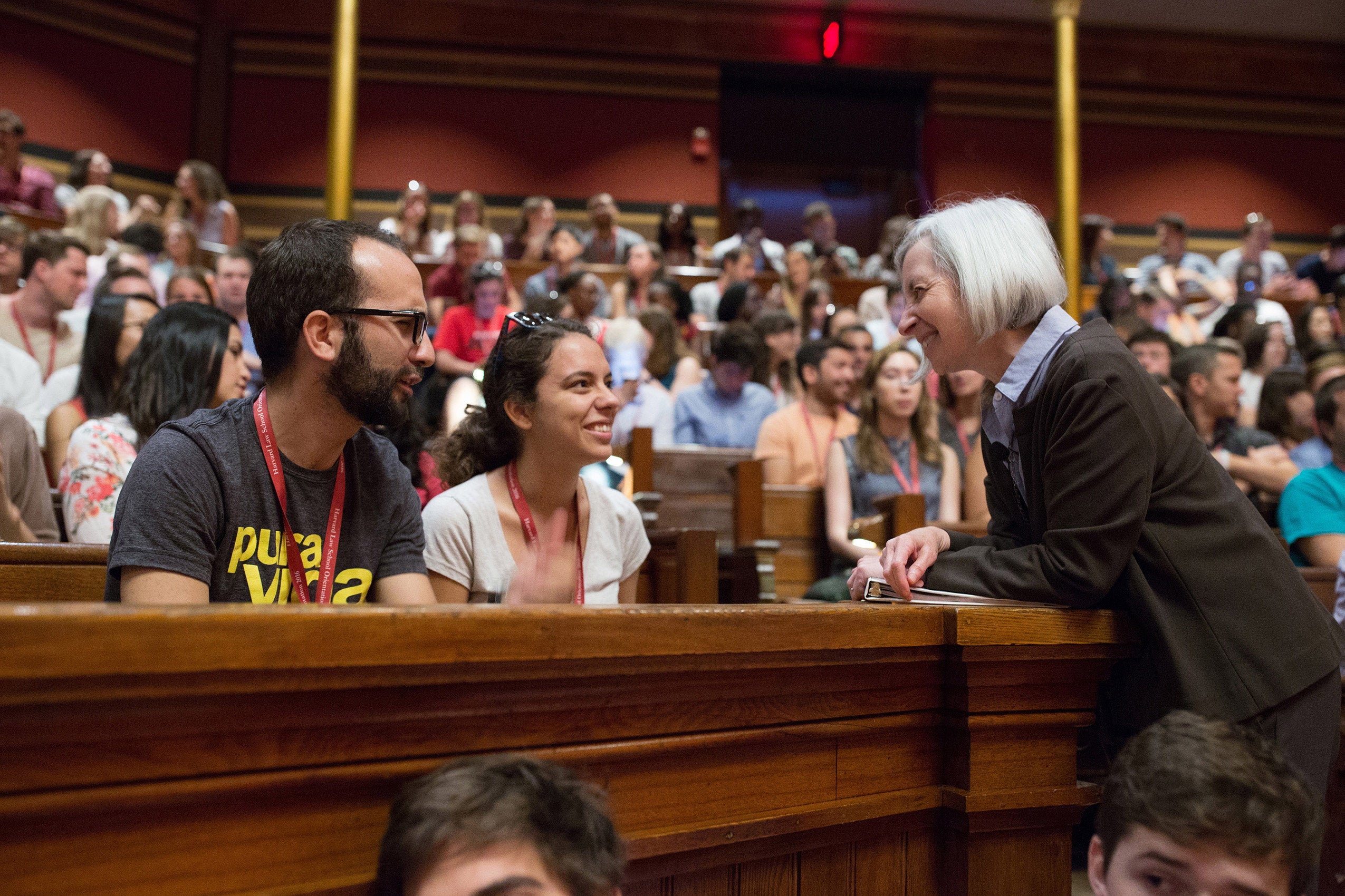 Minow speaking to people in an audience