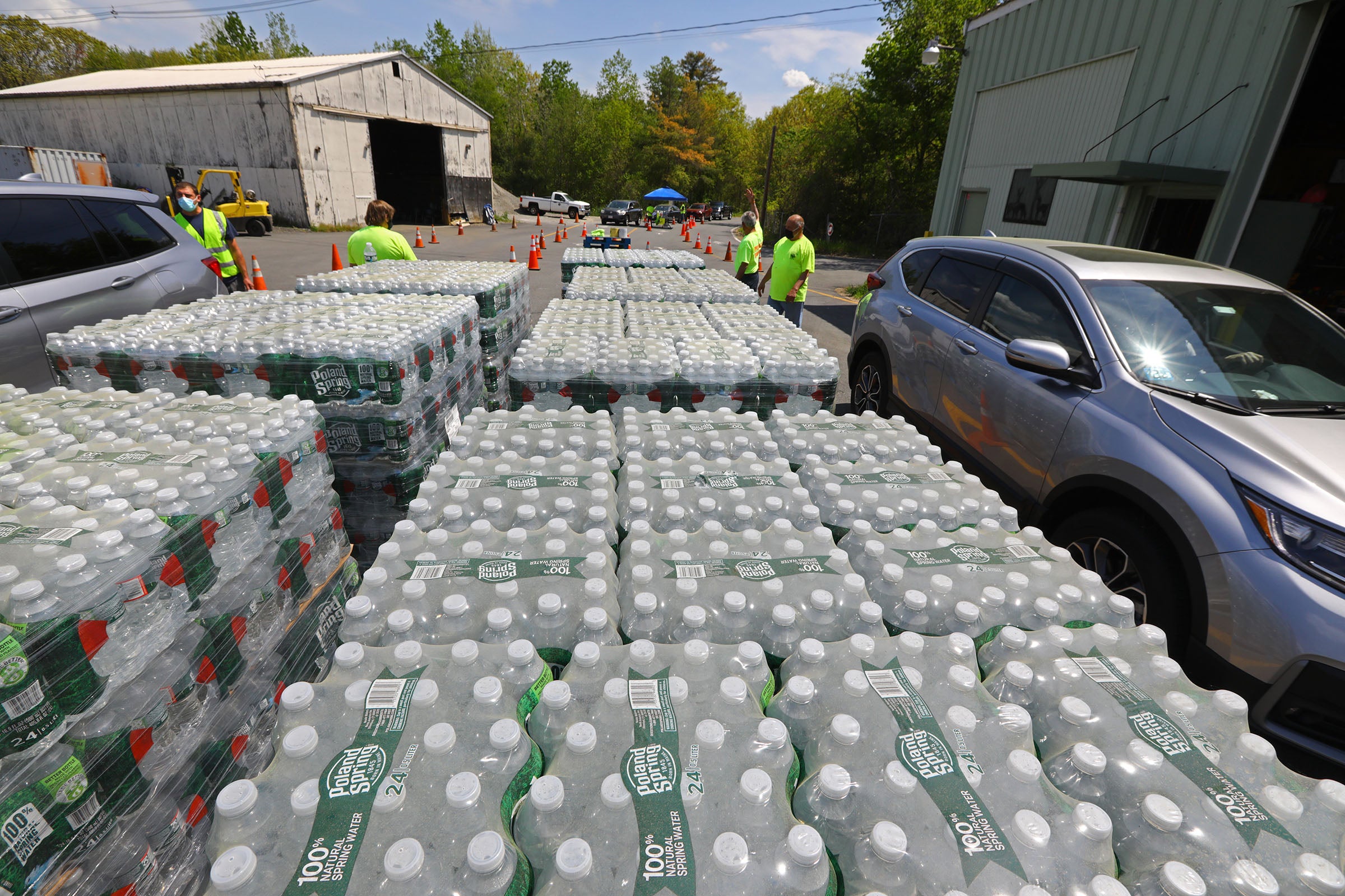 Pallets of bottled water to be distributed.