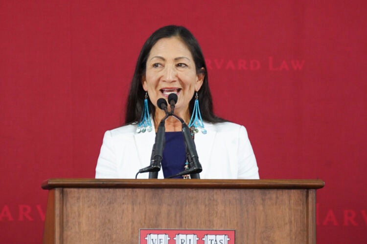 Deb Haaland speaking at a podium