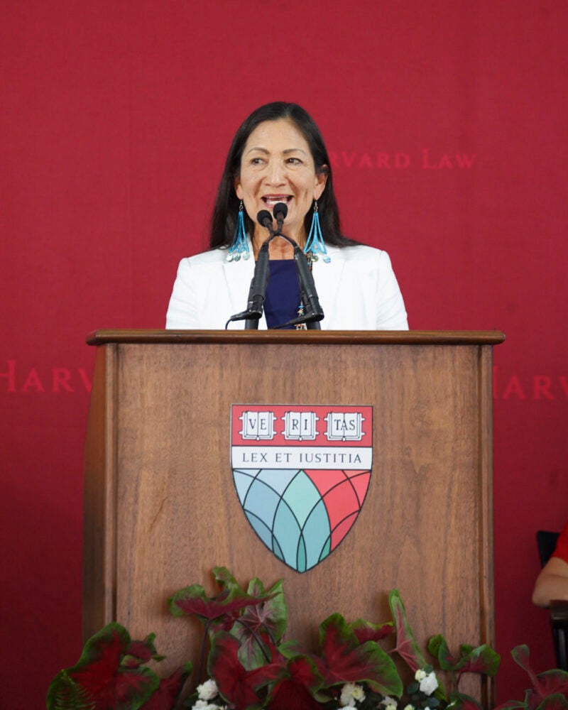 Deb Haaland speaking at a podium
