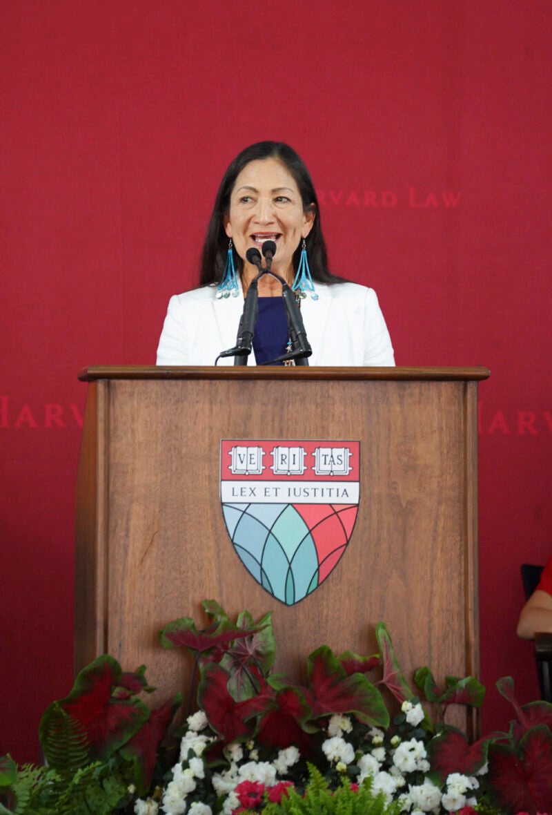 Deb Haaland speaking at a podium