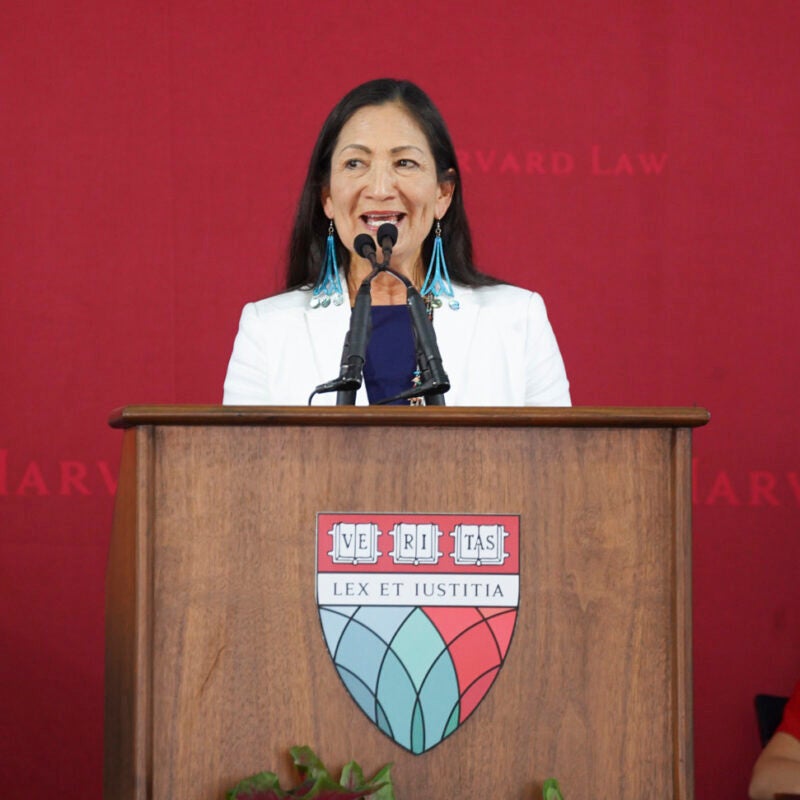Deb Haaland speaking at a podium
