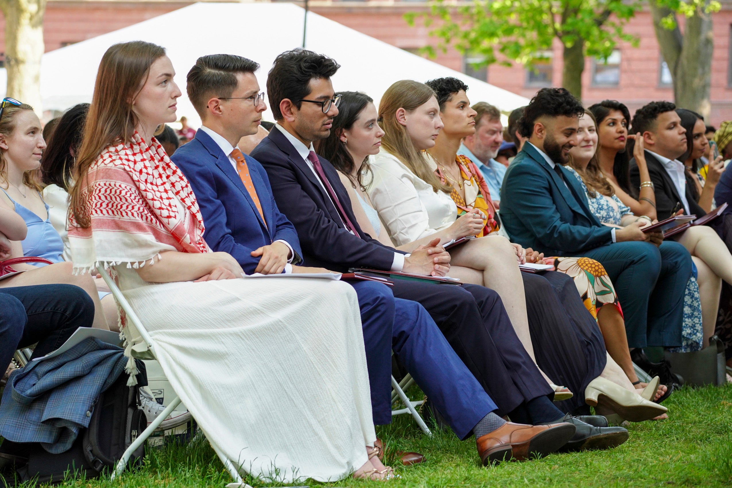 The crowd listening to the program