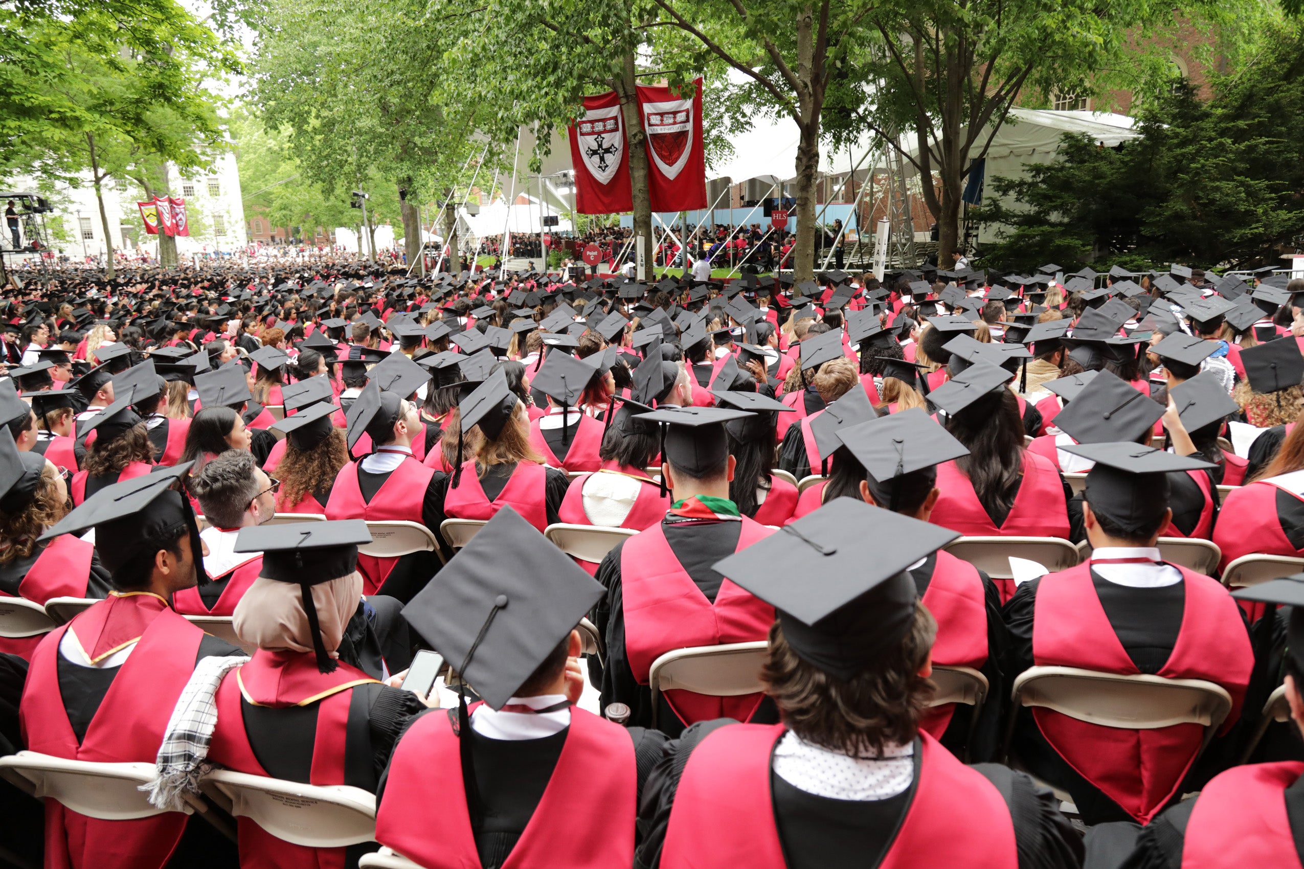 The Class of 2024 seated in Harvard Yard