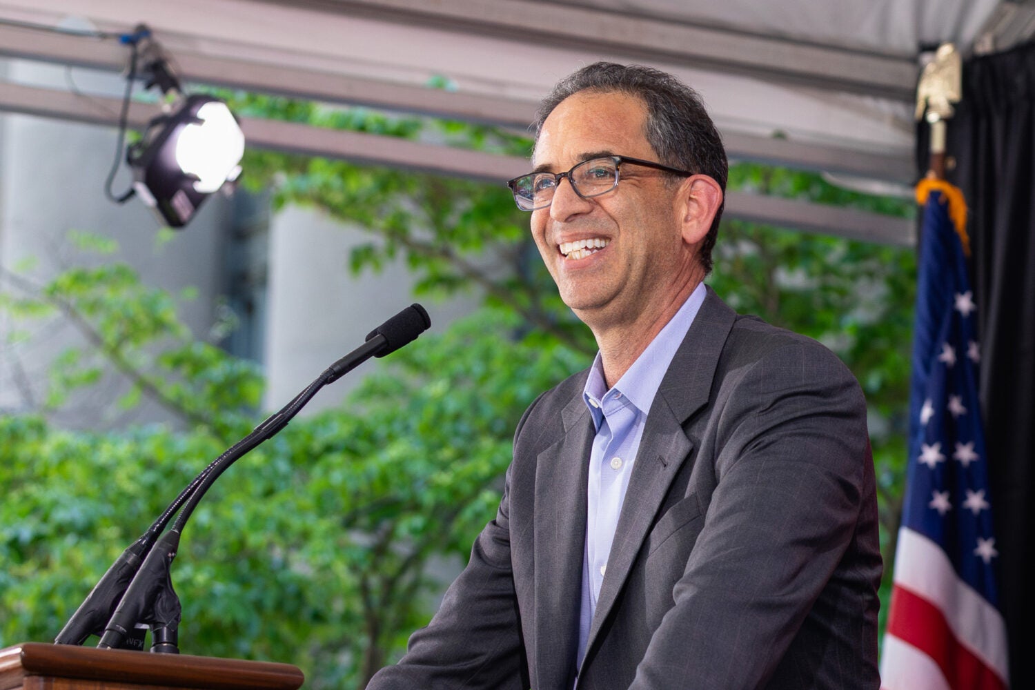 Man speaking at lectern
