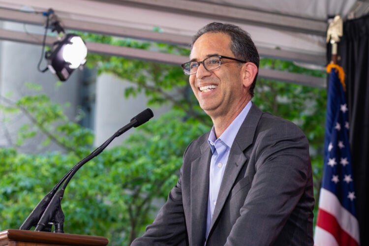 Man speaking at lectern