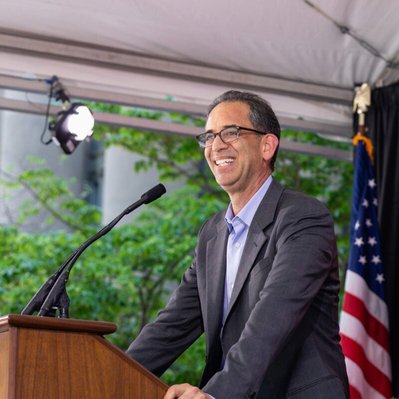 Man speaking at lectern