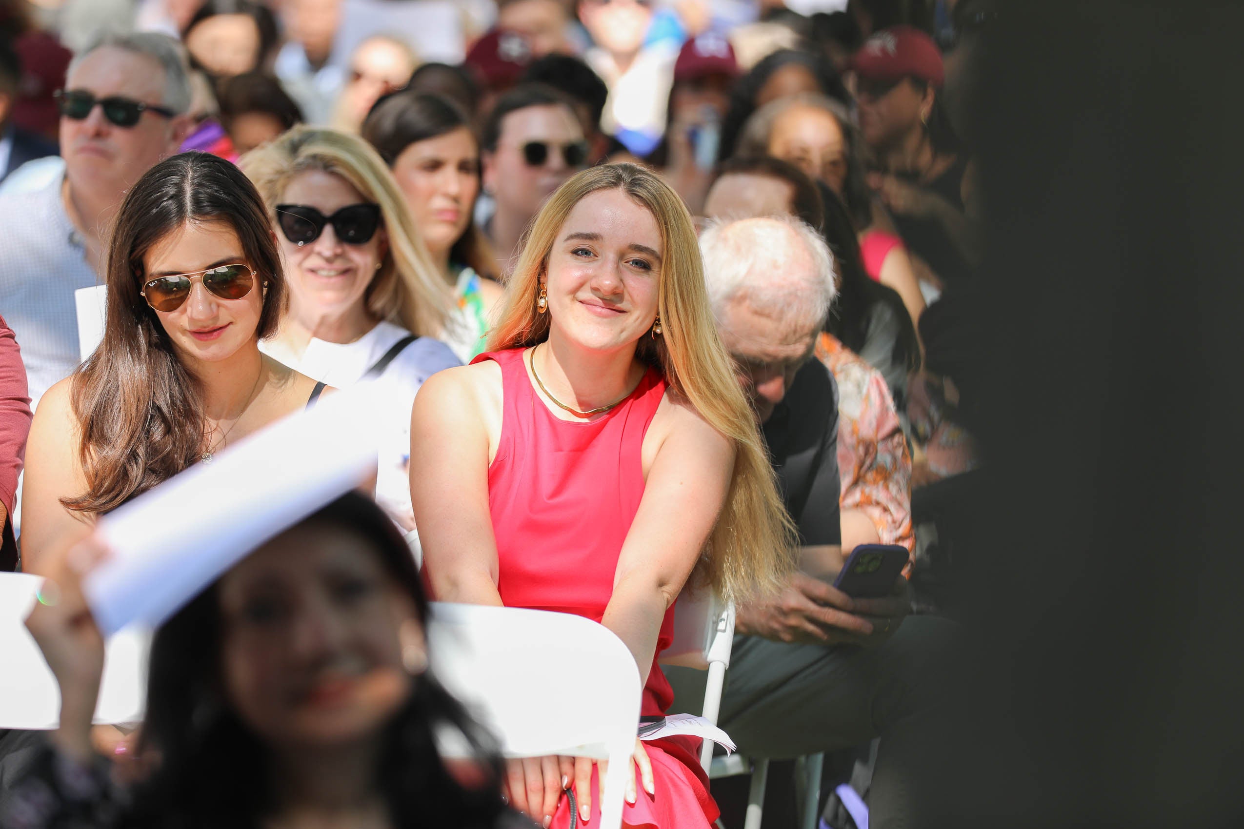 The audience taking in the program