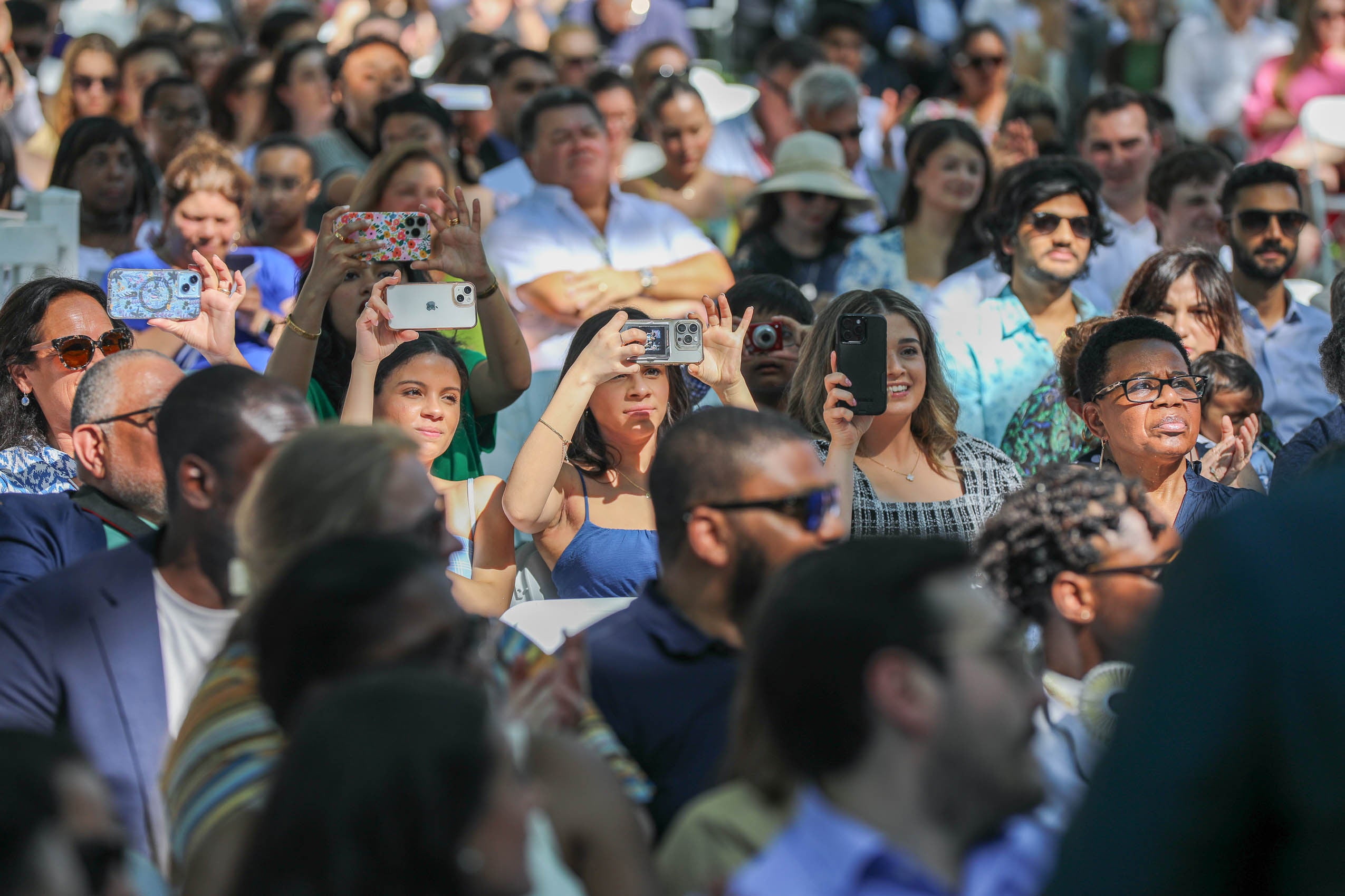 The audience listening to the program