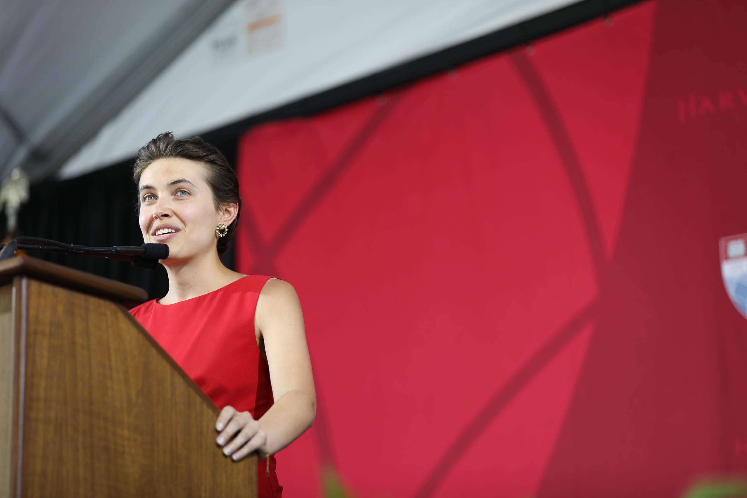 A woman speaking at a podium