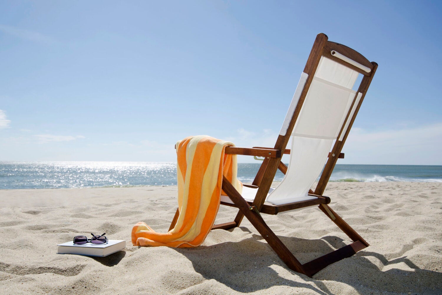 Beach chair by the ocean.