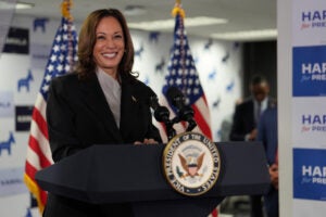 Kamala Harris at podium.