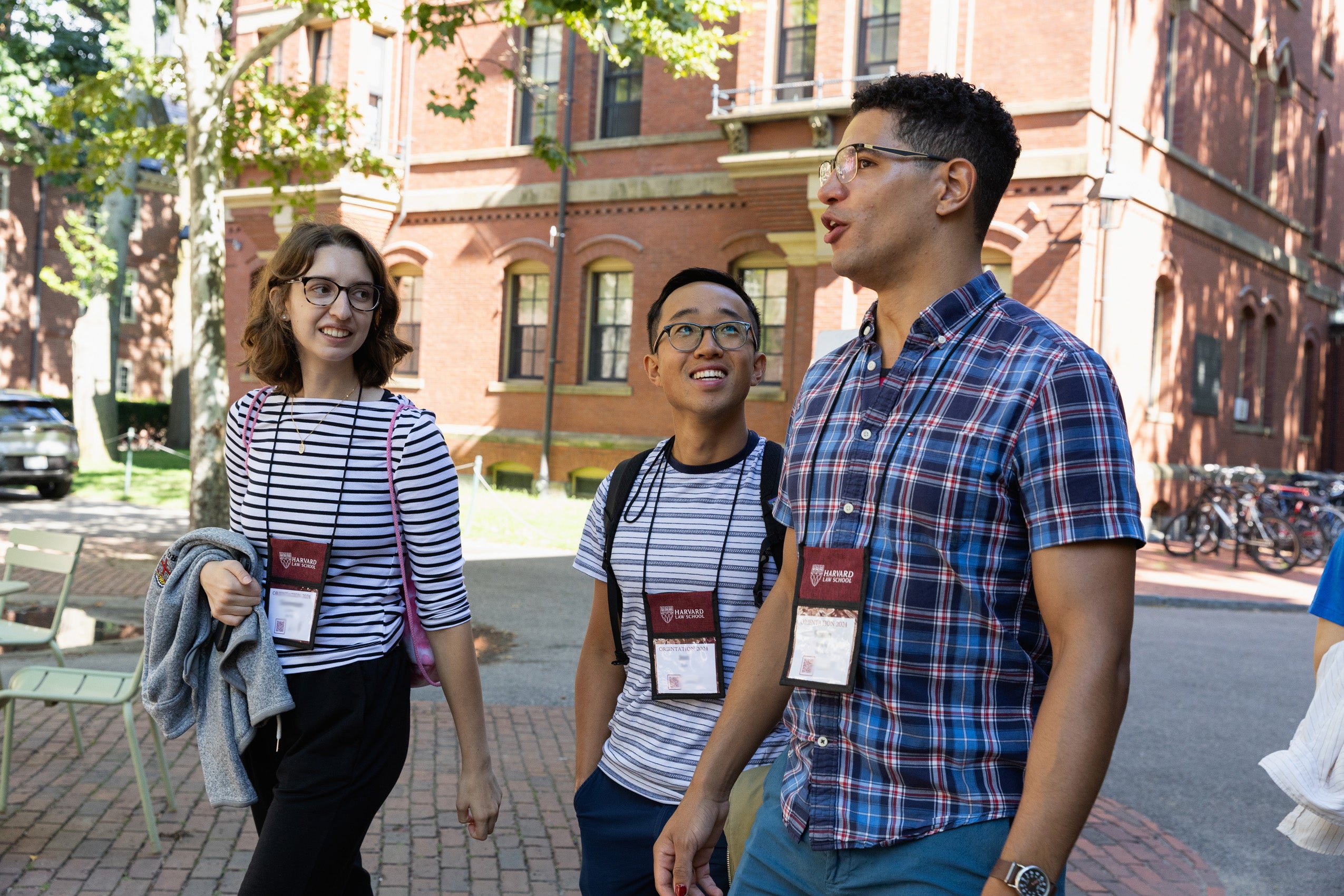 A group of students walking on campus.