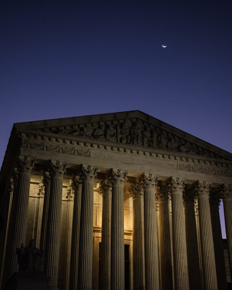 U.S. Supreme Court building at dawn.