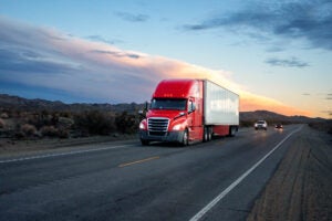 Red semi-trailer truck.