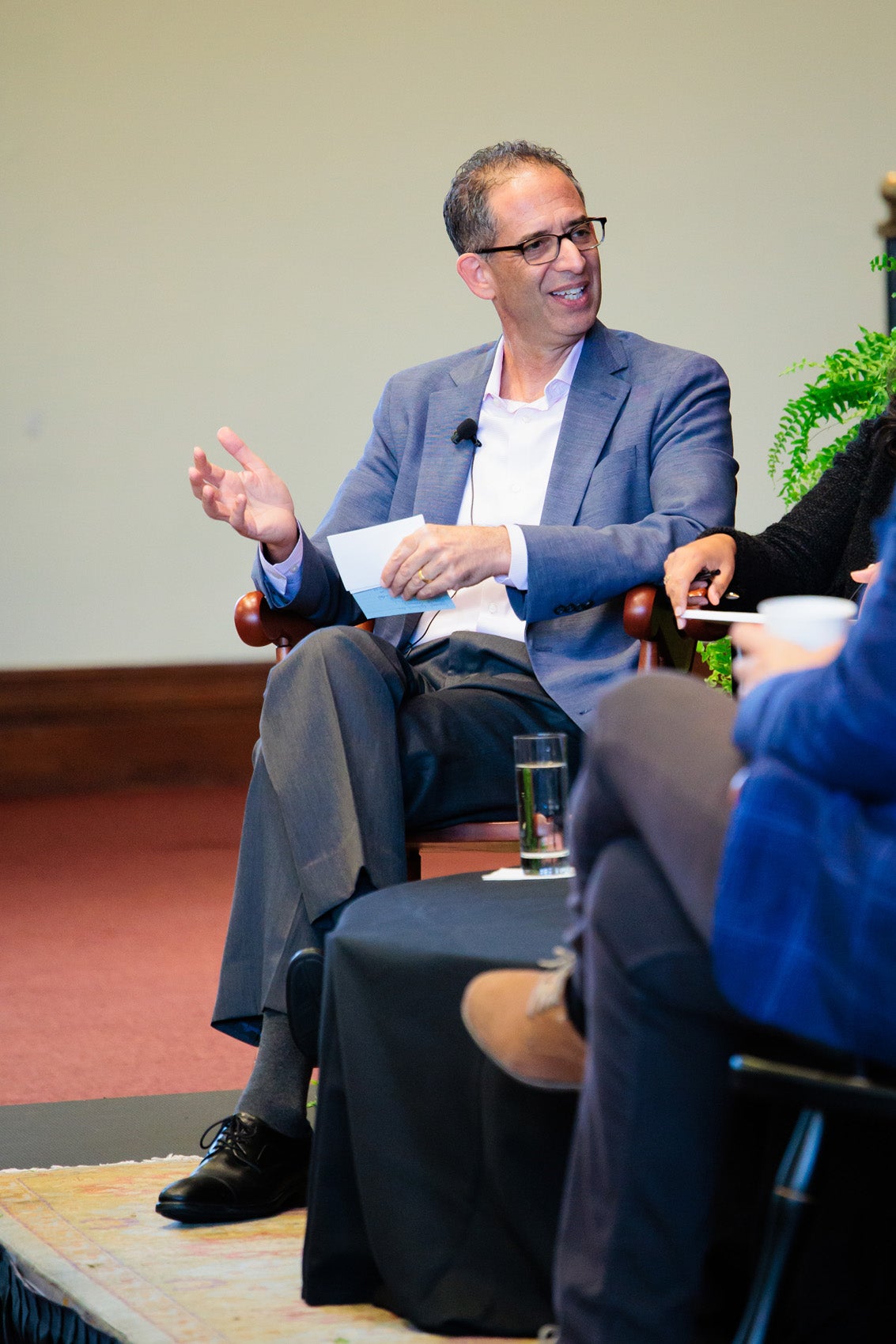 Interim Dean Goldberg gestures as he speaks on panel