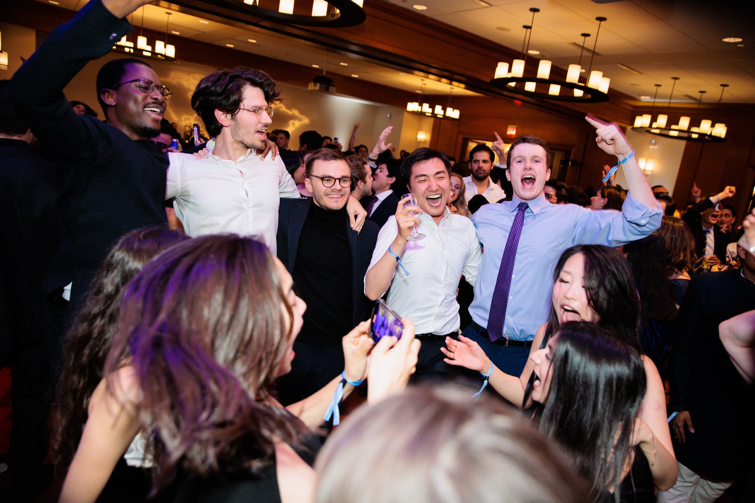 A group of people celebrate at a party