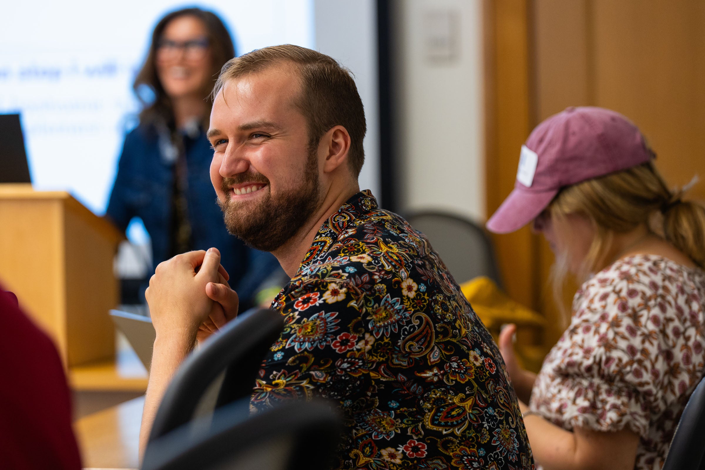 A person listens in a class