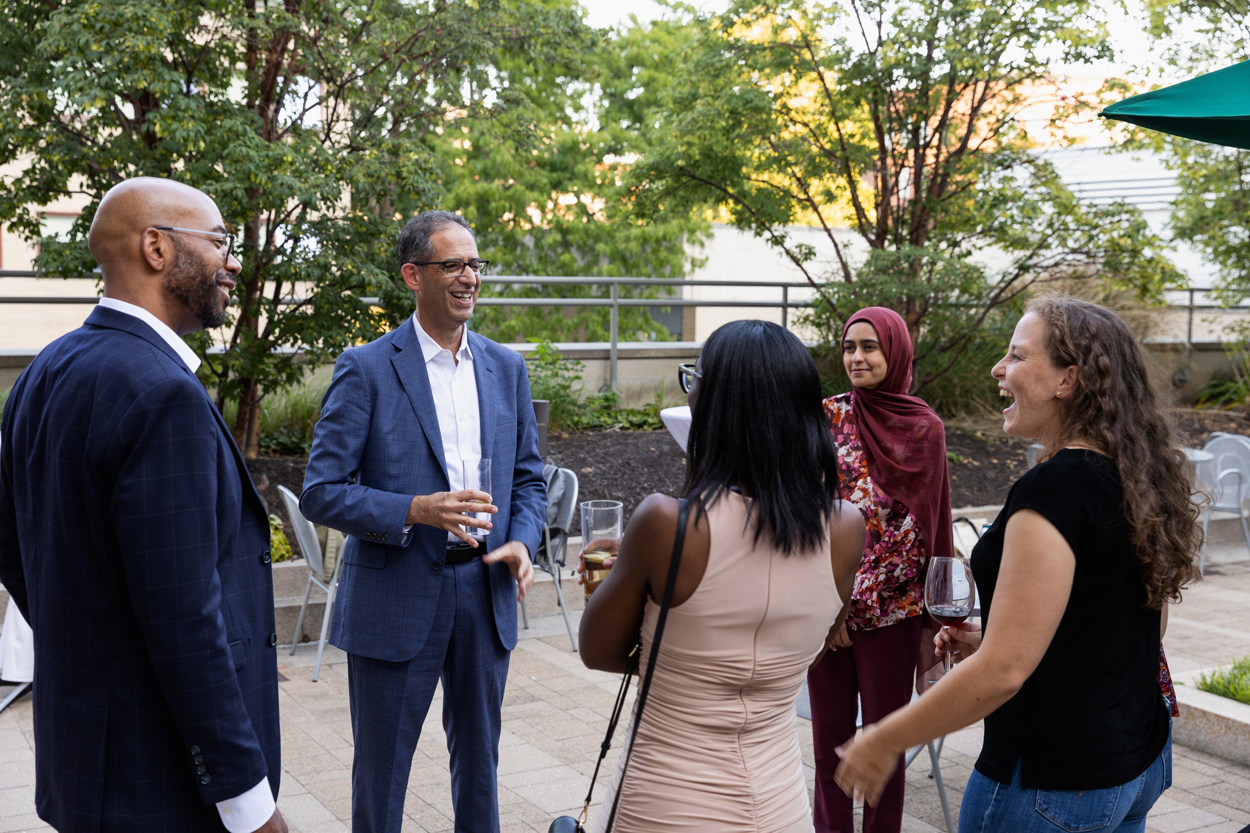 Dean Goldberg and Assistant Dean Stephen Ball at a social event with students