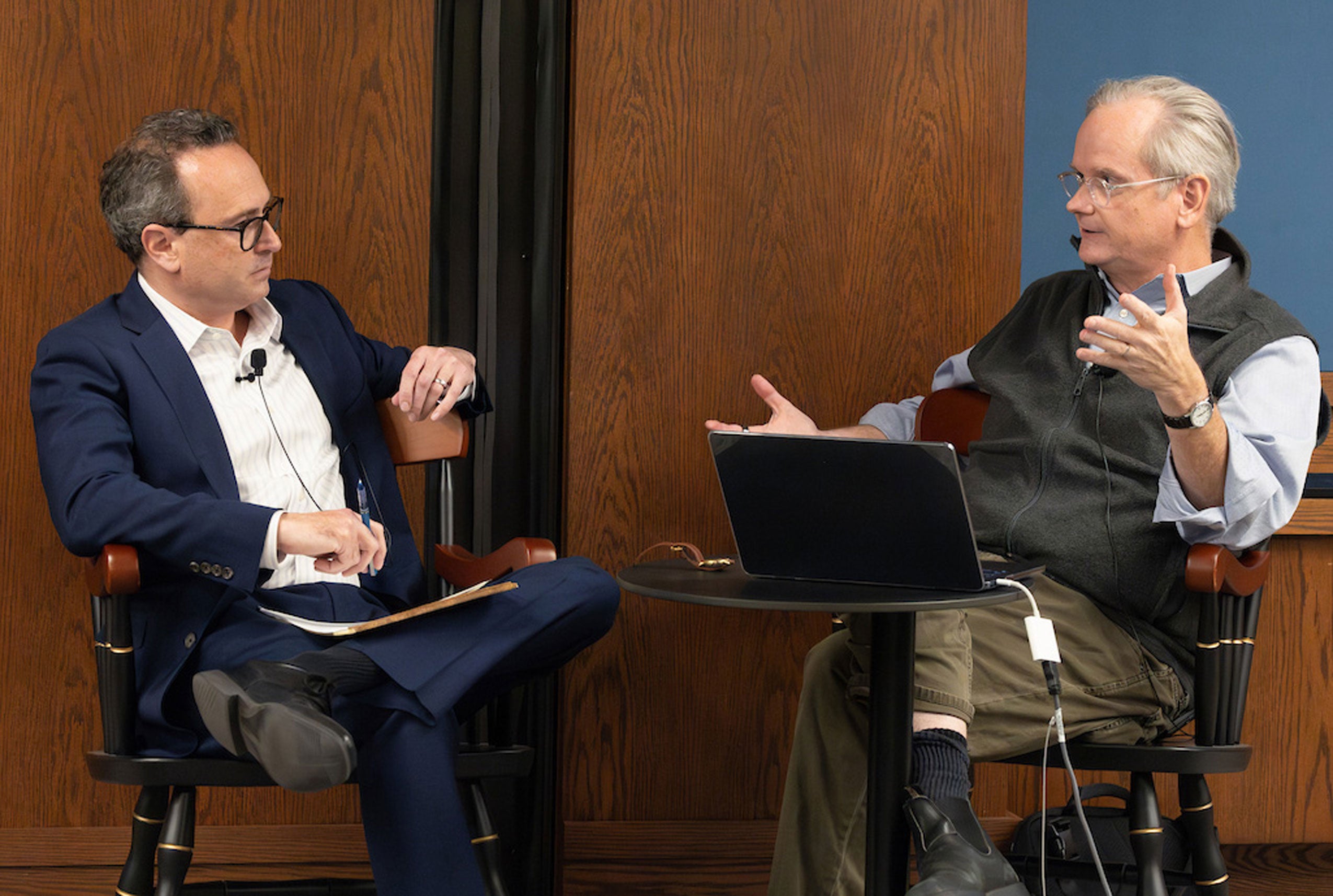 Two men speaking with each other