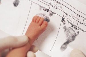 Footprint of child on birth certificate.