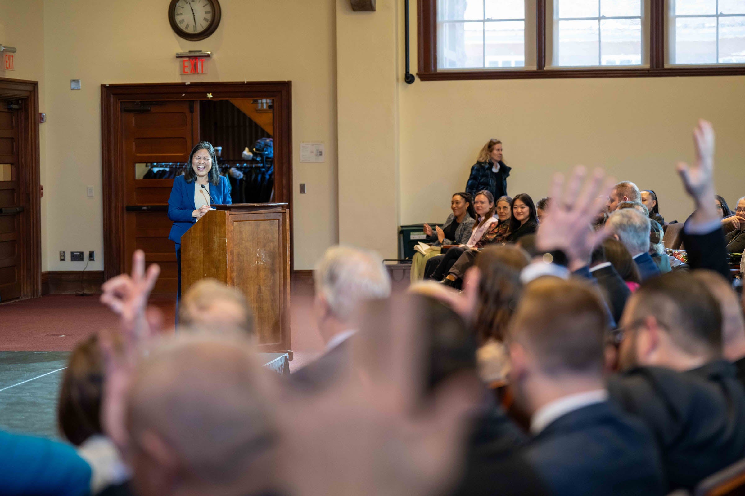 Julie Su interacts with audience at the HTUP graduation ceremony.