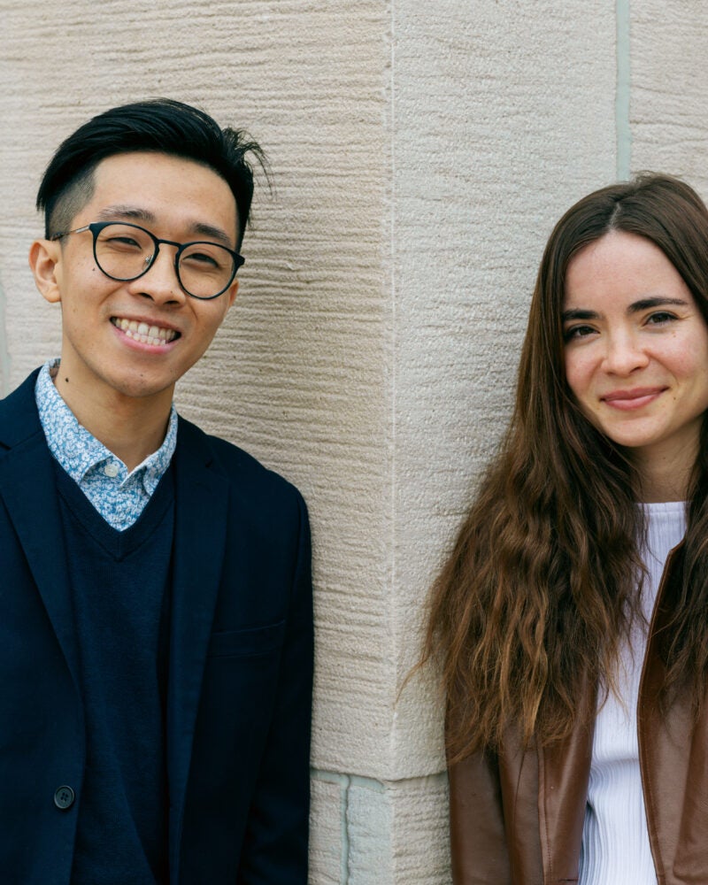 Louis Lin ’25 and Tamara Shamir ’25 stand outside a building