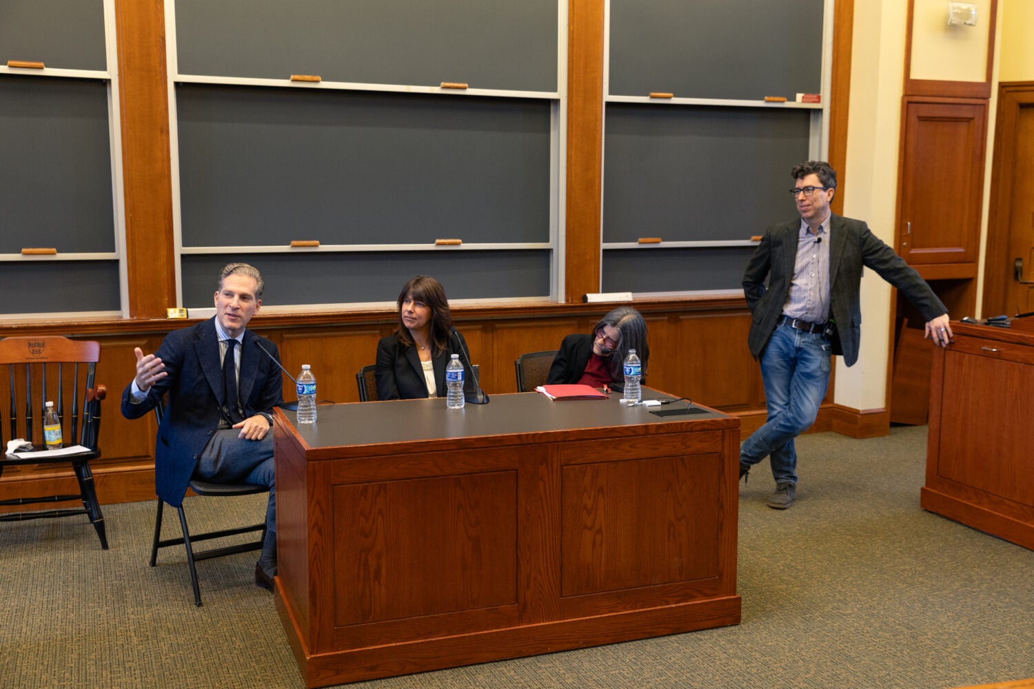 Panelists talking at event.