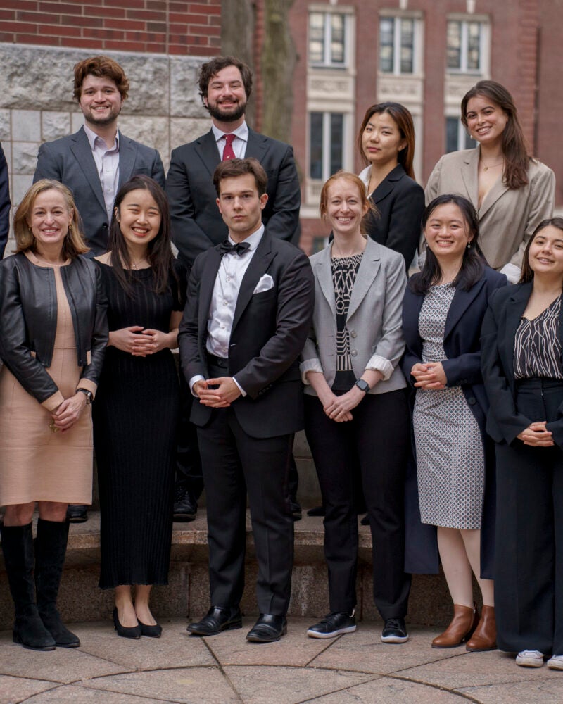 A group photo of participants and judges of the Williston Competition.