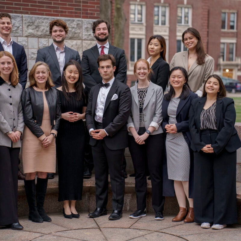 A group photo of participants and judges of the Williston Competition.