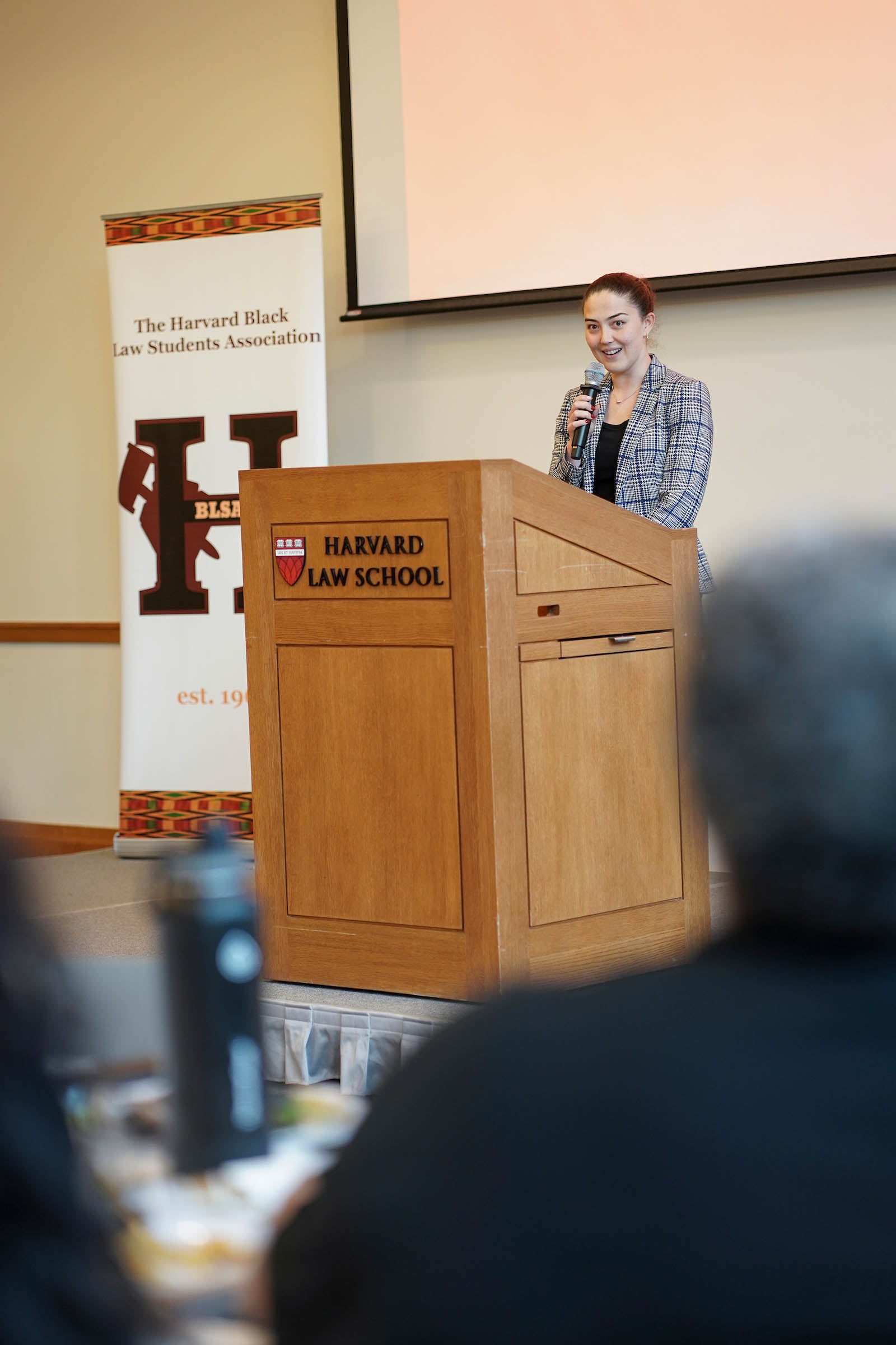 Student delivers remarks from the podium.