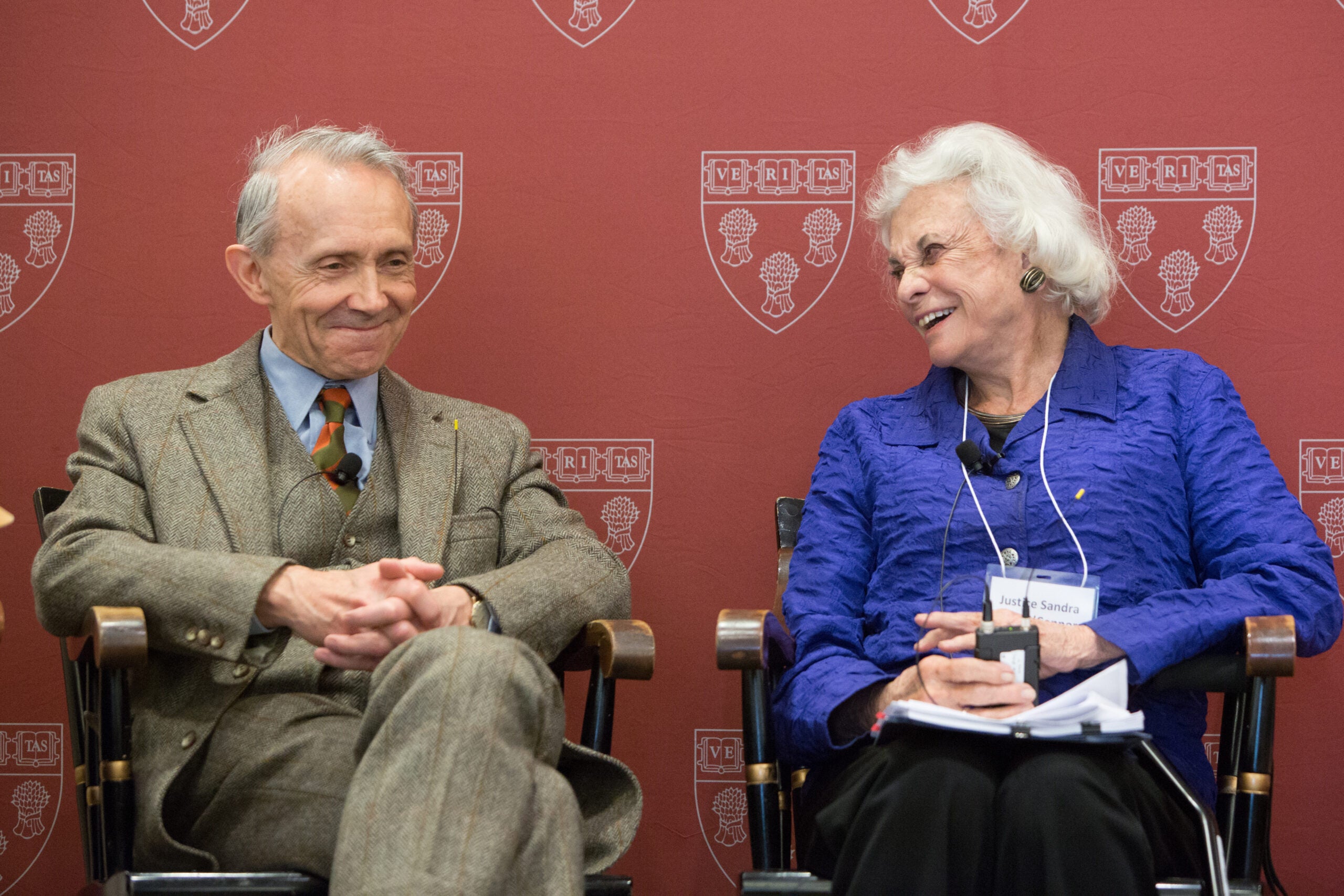 Justice David Souter and Sandra Day O'Connor sitting on a stage.