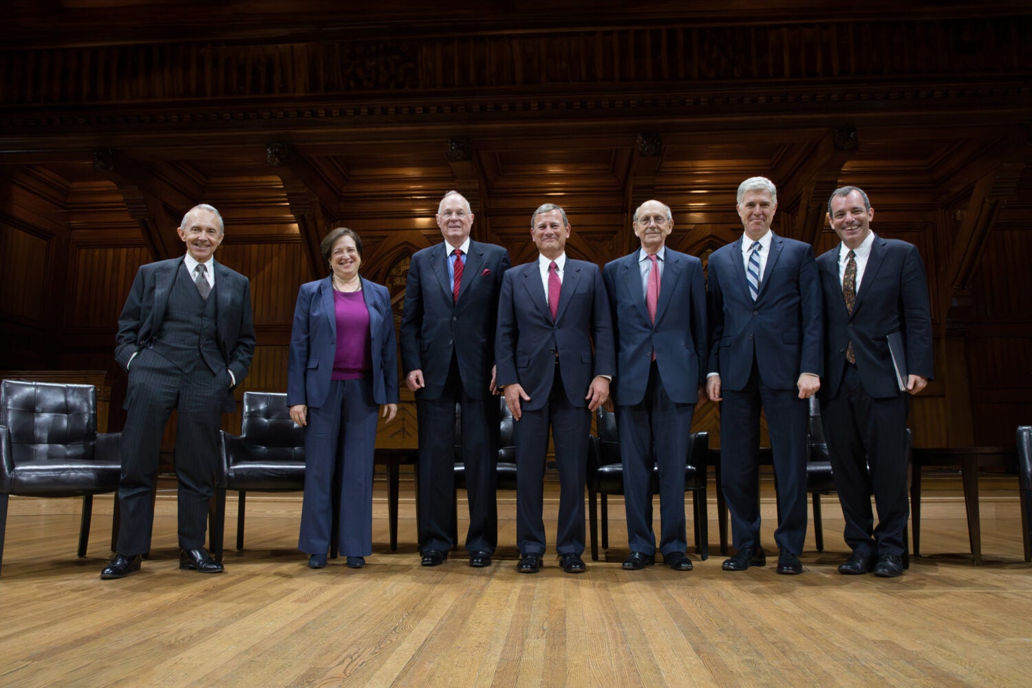 A row of people on a stage.