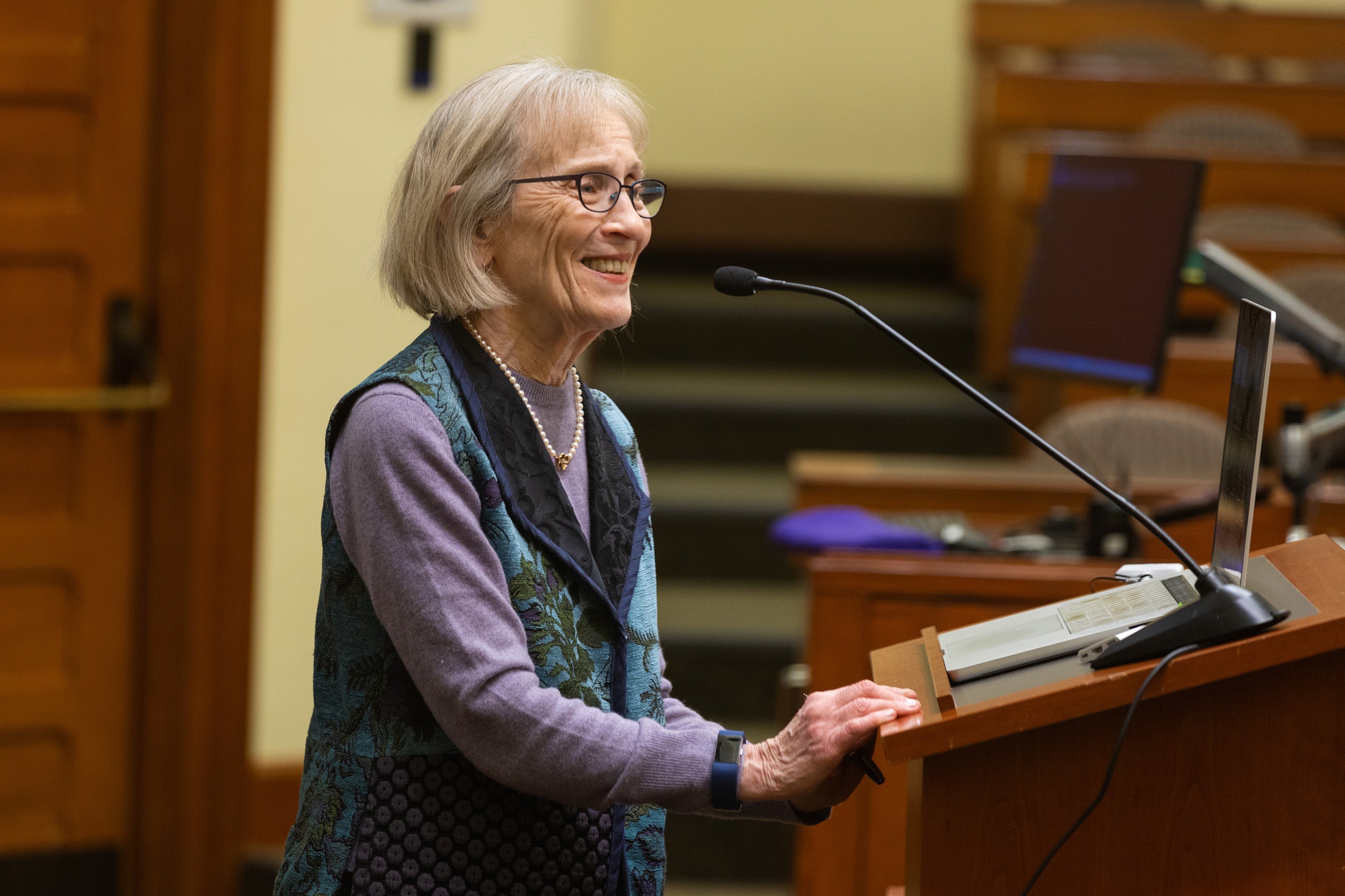 Claudia Goldin at a podium