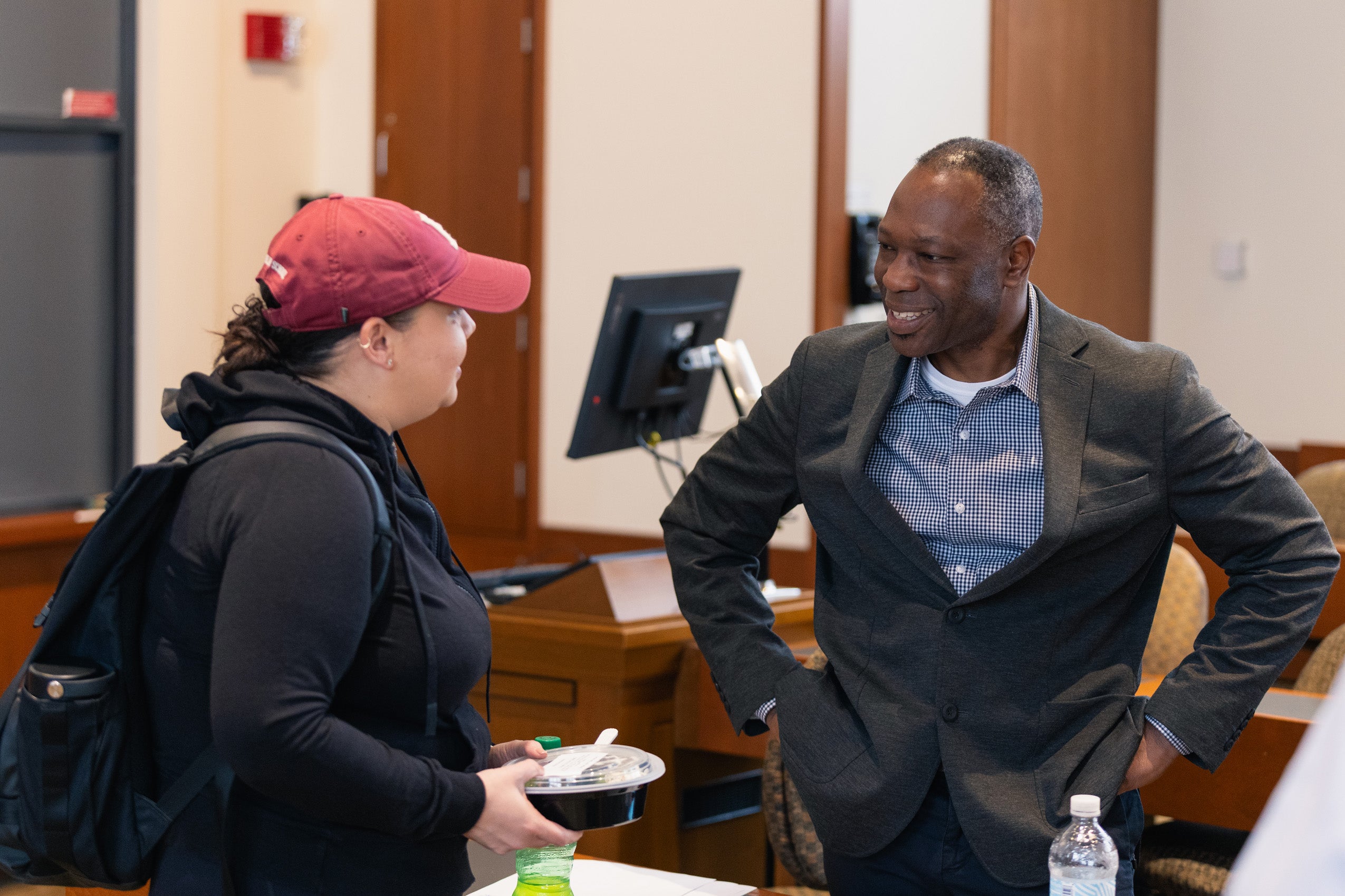 Guy Uriel Charles speaks to a student following his talk as part of the Class of 2025 Last Lecture series.