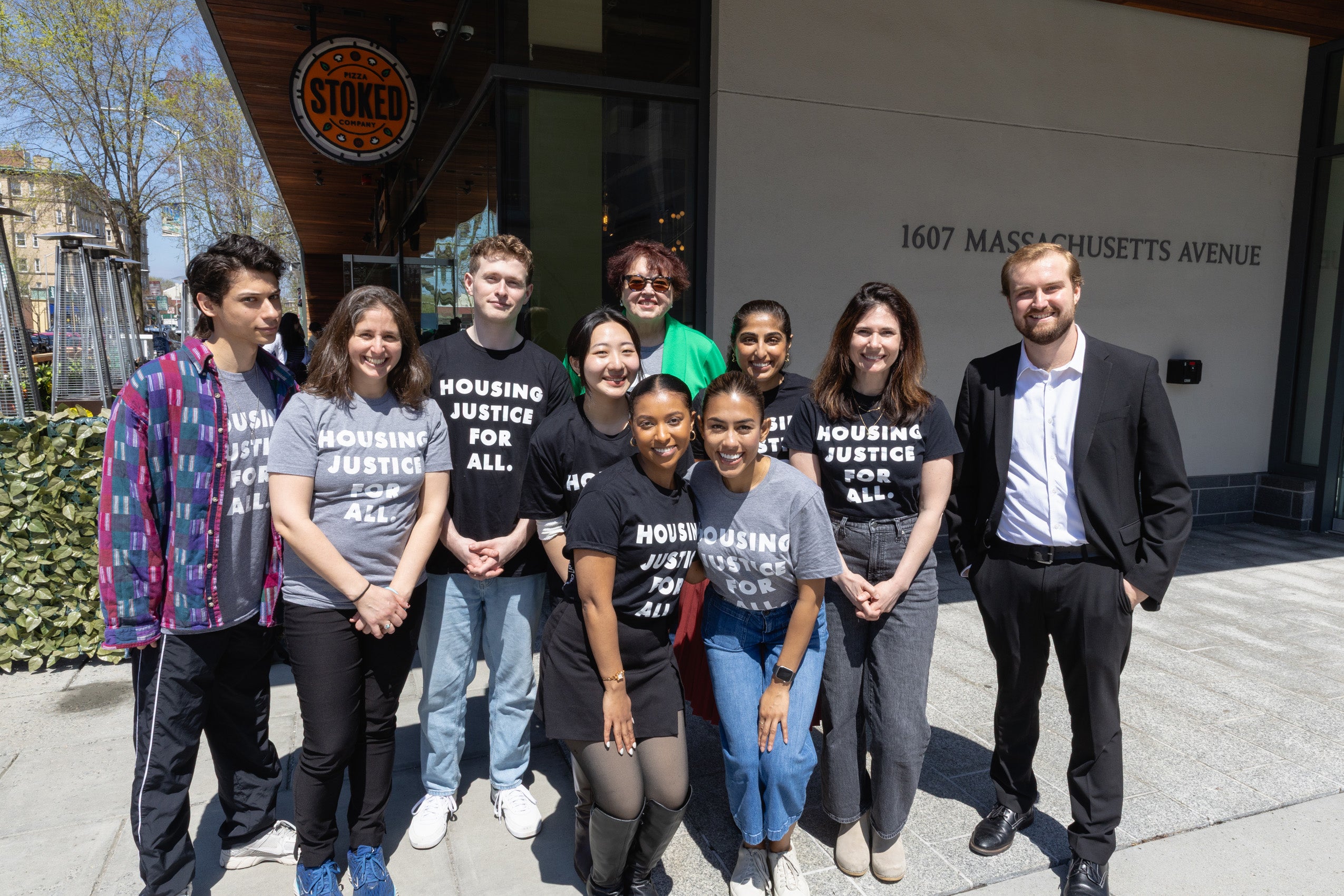 A group of students wearing shirts that say 