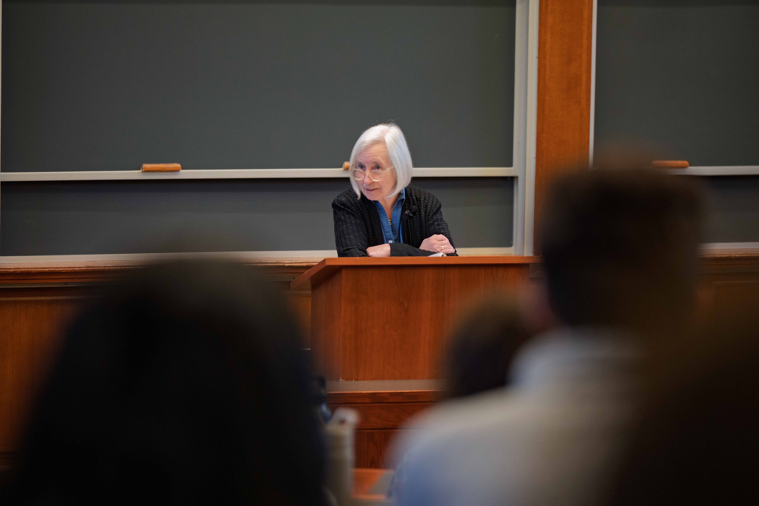 Martha Minow speaking at a podium.