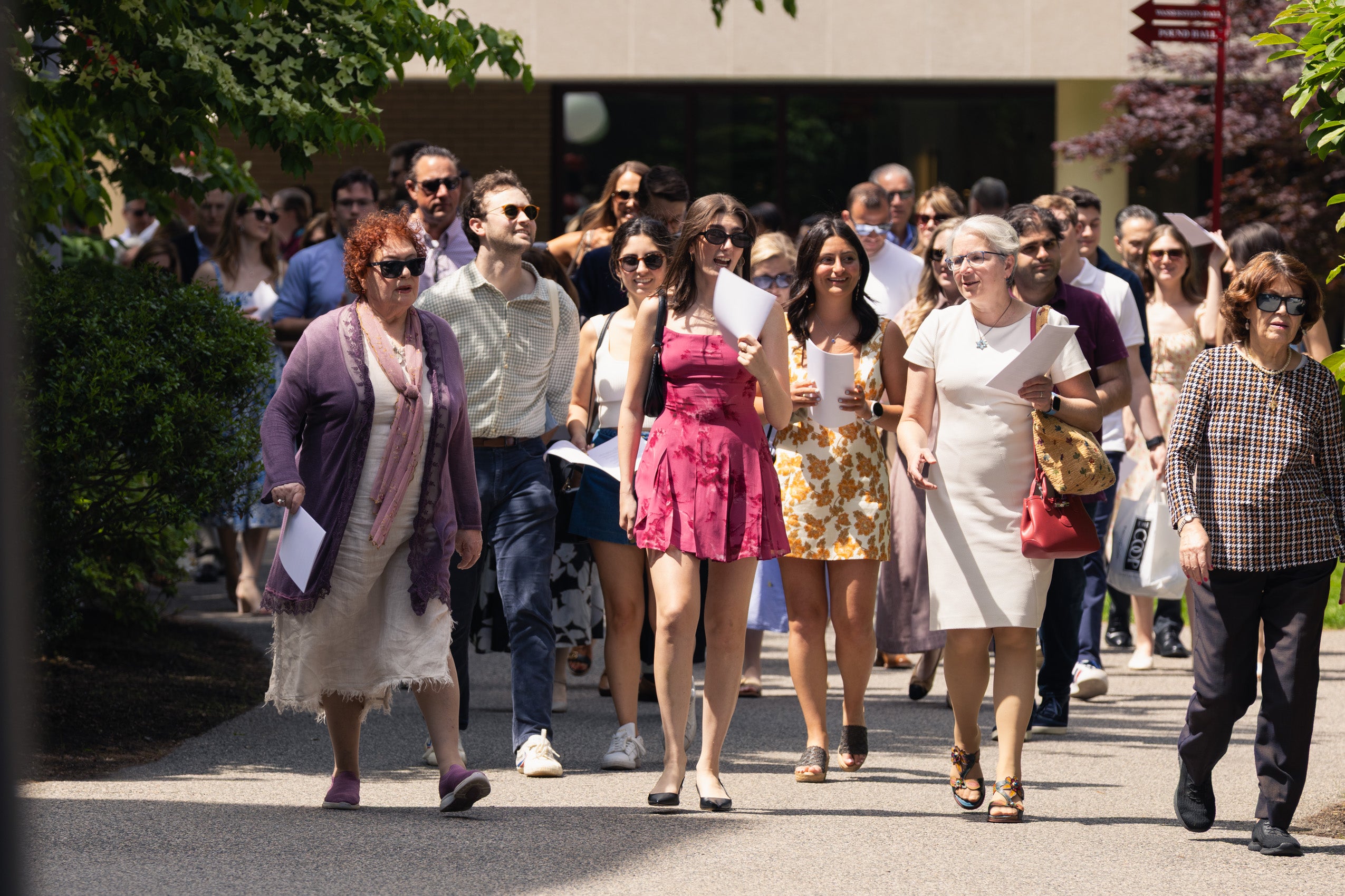 A crowd walking along a path.