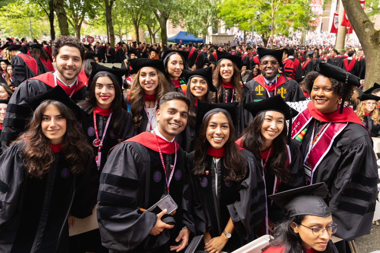 A group of graduating students posing together