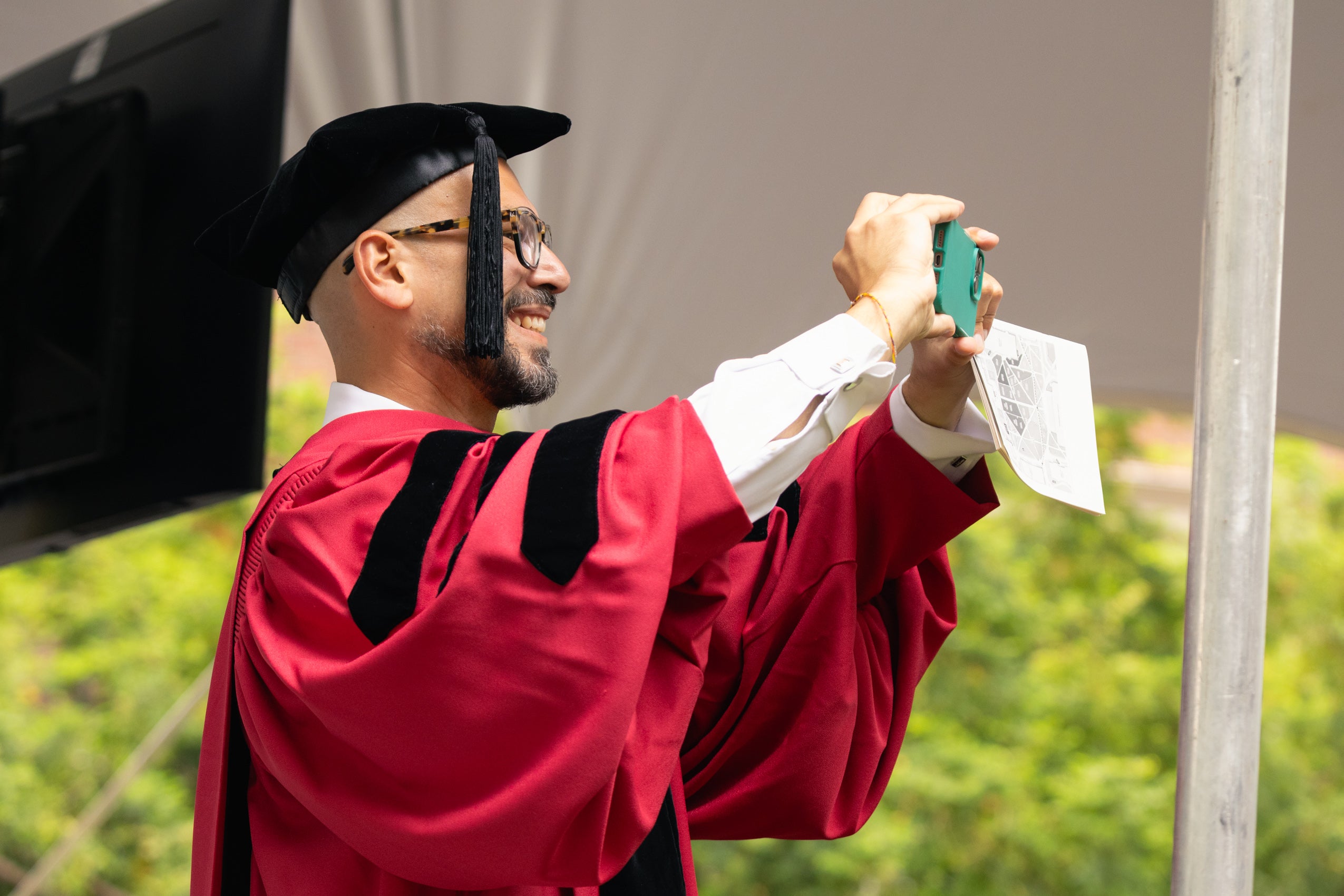 A man taking a photo on his phone