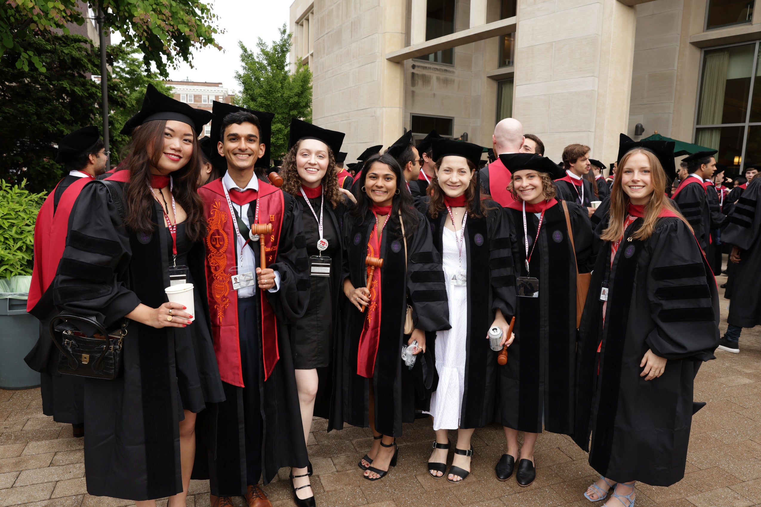 Graduates standing and smiling together