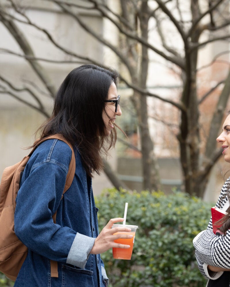 Two HLS students in a conversation