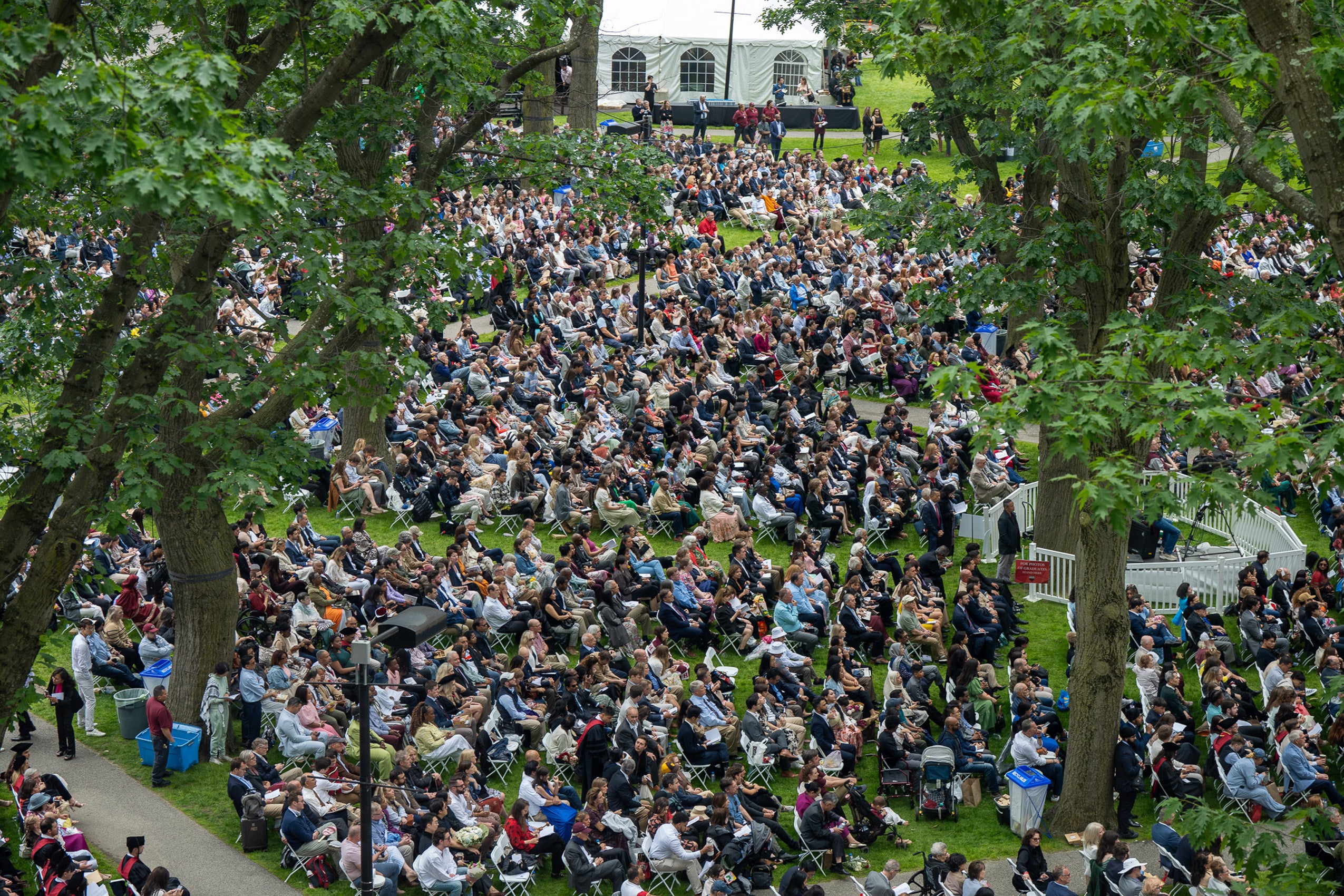 An aerial view of the audience for Commencement on Holmes Field.