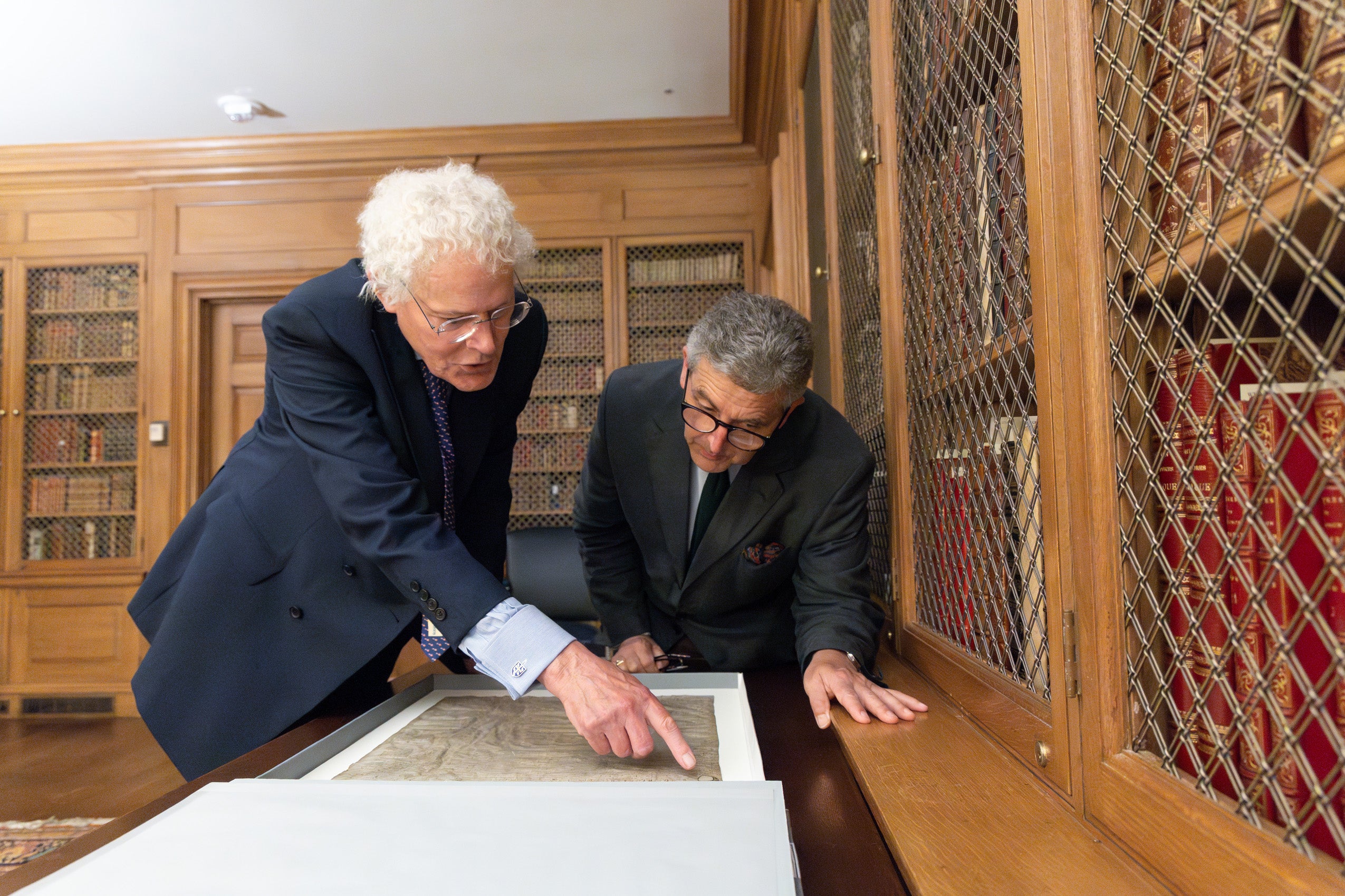 British researchers, David Carpenter and Nicholas Vincent visit the Magna Carta at Harvard University’s Houghton Library.