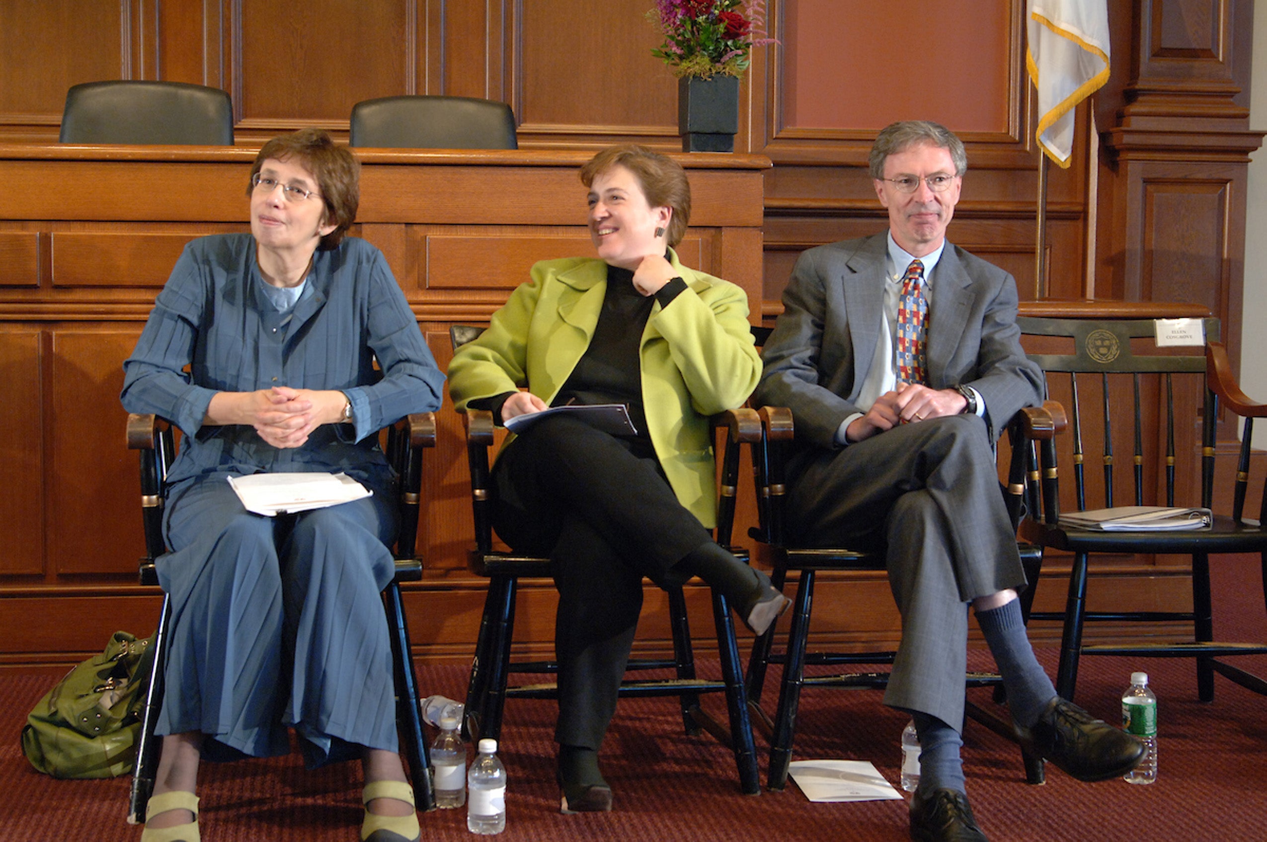 Richard Fallon sits with two others in the Ames Courtroom at Class Day.