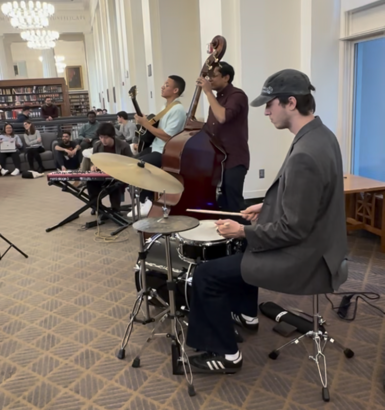student musicians playing jazz in the HLS library.