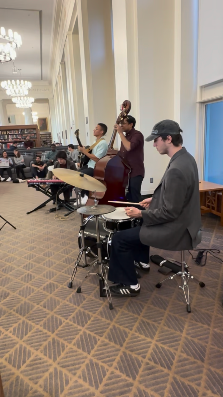 student musicians playing jazz in the HLS library.